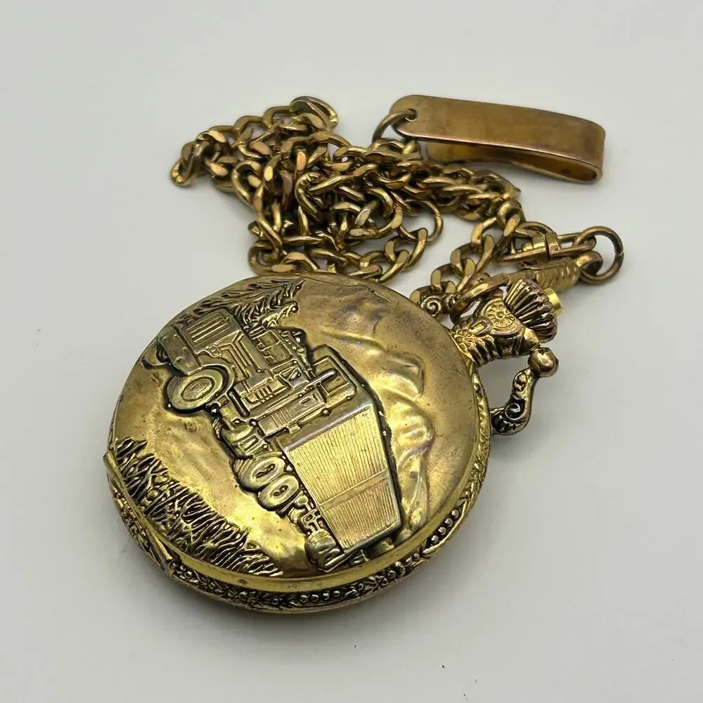 Vintage Details Gold Tone Truck Emblem Cover Pocket Quartz Watch